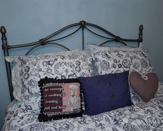 Ornate Metal Headboard W/ Decorative Pillows