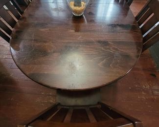 Large Ethan Allen dining room table.  Includes two sleeves to extend to fit 8-10 people.