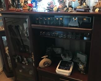 Capodimonte and eagle statues. Crystal paperweights too! More wolf collectibles!