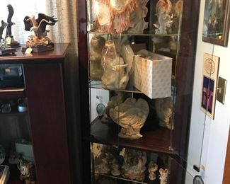 Curio cabinet is a buck too! Seraphim angels too’