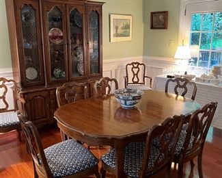 Thomasville China Cabinet (79"H x 62"W x 16"D) & Rounded Rectangular Dining Table (60"L x 42"W x 29-1/2"H with 2 leaves 12"L each) with 6 Side Chairs & 2 Armchairs
