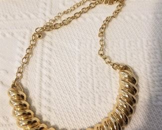 Gold tone collar necklace