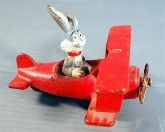 Vintage Metal Bugs Bunny In Bi-Plane, Metal Locomotive Pencil Sharpener, Key Chain, And Glass Gun Candy Dispensers, Qty 2