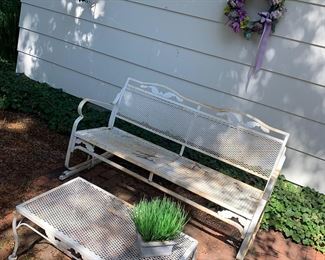 Vintage wrought iron garden glider