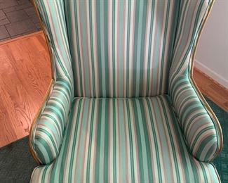 1 of 2 green and pink wing back chairs