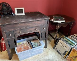This vintage desk is a perfect restoration project for the right person.  There is also a square end table in the corner that needs some love.
