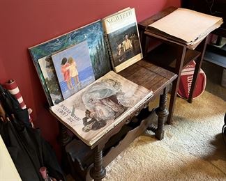 This darkwood table will add some style to your room.  Some of the unframed paintings are here, too.