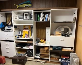 I haven't quite figured out what the big silver item is in the far right shelf.  The round hole has a mesh screen inside.  Come see for yourself what it is.