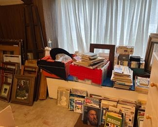 There are a number of empty frames, books, and classic magazines in the sale.