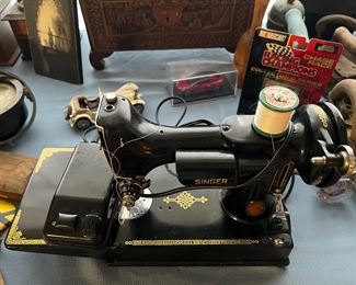 For the sewer in the family, this classic featherweight Singer sewing machine could be the perfect gift.