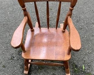 Child's rocker with music box.