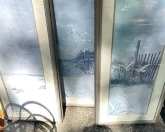 Three-piece beach scene.