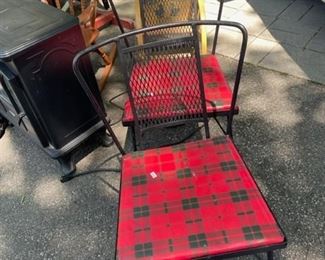 Pair of wrought iron chairs.