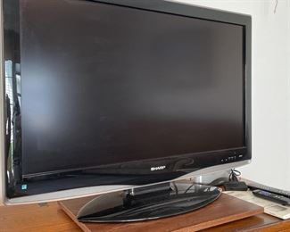 Sharp Brand 42 Inch TV Aquos Model with Roku Cord and Remote and Radio Shack Antenna