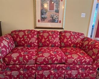 Lovely vibrant red floral
patterned sofa