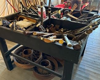 old hand tools, old tire rims