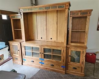 $200 -OR- Priced separate 
6pc Oak Mission style TV stand w/2 side cabinets, slate tile& glass inserts.  $150, middle cabinet section, $60 ea Side cabinet. Middle part is W 63 xH82 xD20.  Side cabinets w21.5xH 74xD 20