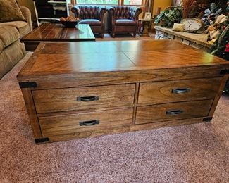 $120 Coffee table w/ 4 drawers & casters