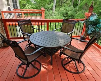 $225 Metal Patio table with 4 rocking armchairs, arms have some slight marring