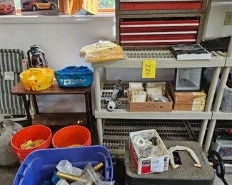 $15 Short beige shelf, $30 Tool chest