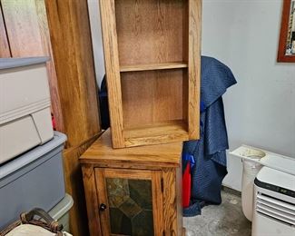 Each cabinet is two separate pieces, even middle section is a top and the bottom which could be used independent of each other