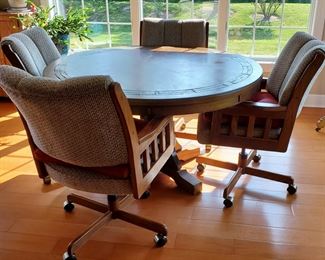 Round dining table w/ four chairs