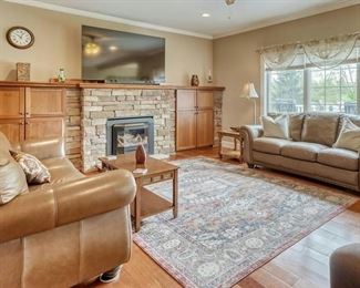 Pr brown leather sofas, coffee table and large Samsung