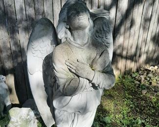 Approximately 4 foot tall Angel to brighten your garden