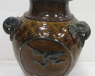 CHINESE BROWN GLAZE POTTERY VASE WITH ELEPHANT HANDLES. 12.75" TALL. MULTIPLE GLAZE CHIPS, NO CRACKS