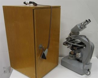 KYOWA LUMISCOPE ELECTRIC MICROSCOPE. HAS WOOD CASE, AND SIX LENS