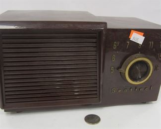 OLD SENTINEL TABLE TOP RADIO CASE IS 10 X 5.5". POWERS UP AND RECEIVES SIGNAL, SOME STRONG STATIONS, NOT TESTED WITH ANTENNA