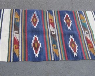 SOUTHWEST RUG. 5' X 2'6" HANDMADE WOOL. COLOR RUN ON ONE CORNER