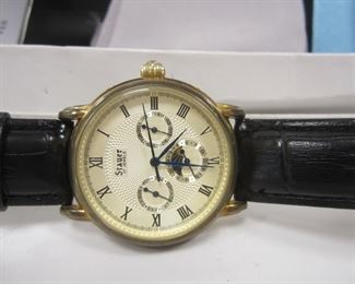STAUER 27 JEWELS MEN'S WATCH. BOX AND LEATHER BAND ARE WORN