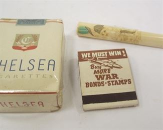 PACK OF CHELSEA CIGARETTES, WAR BOND MATCH BOOK, AND VINTAGE CIGARETTE HOLDER