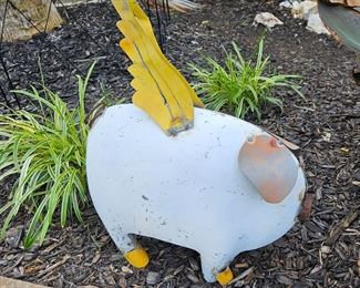 Pigs fly yard art