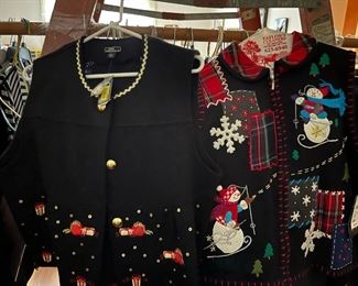 Lady Christmas sweaters,  some with tags still on them.