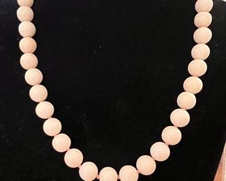 Angel skin coral beads with 14k clasp