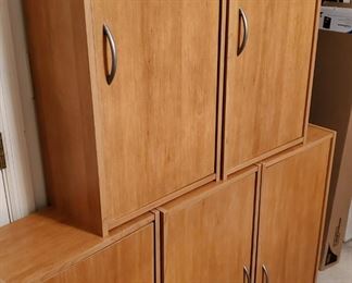 Each w/ 2 adjustable shelves and reversible doors