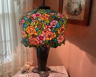 English Rose Reproduction Tiffany by Dale Tiffany . More than 1,000 pieces of stained glass . Hand rolled and copper foiled. Triple chain socket. 32” H x 18” D.