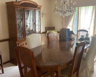 Dining room table 6 chairs leaves, and China cabinet