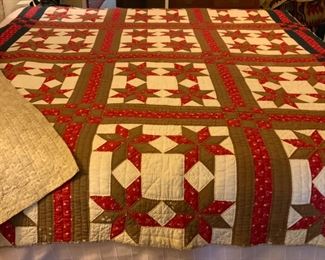 Hand Stitched Quilt.  73”  x. 83”