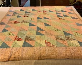 Hand Stitched Quilt.  58”  x. 73”