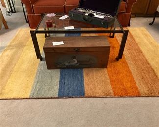 Saxaphone,  trunk, and rug