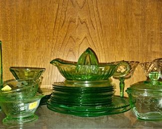 Several pieces of green depression glass available. 
