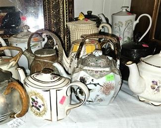 A very varied collection of tea pots.