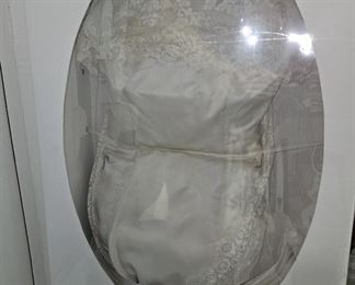 A beautiful wedding dress. Preserved in a sealed box.  