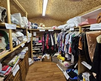 This closet is literally packed with linens, bedding, clothes, Christmas, Purses, and on and on.