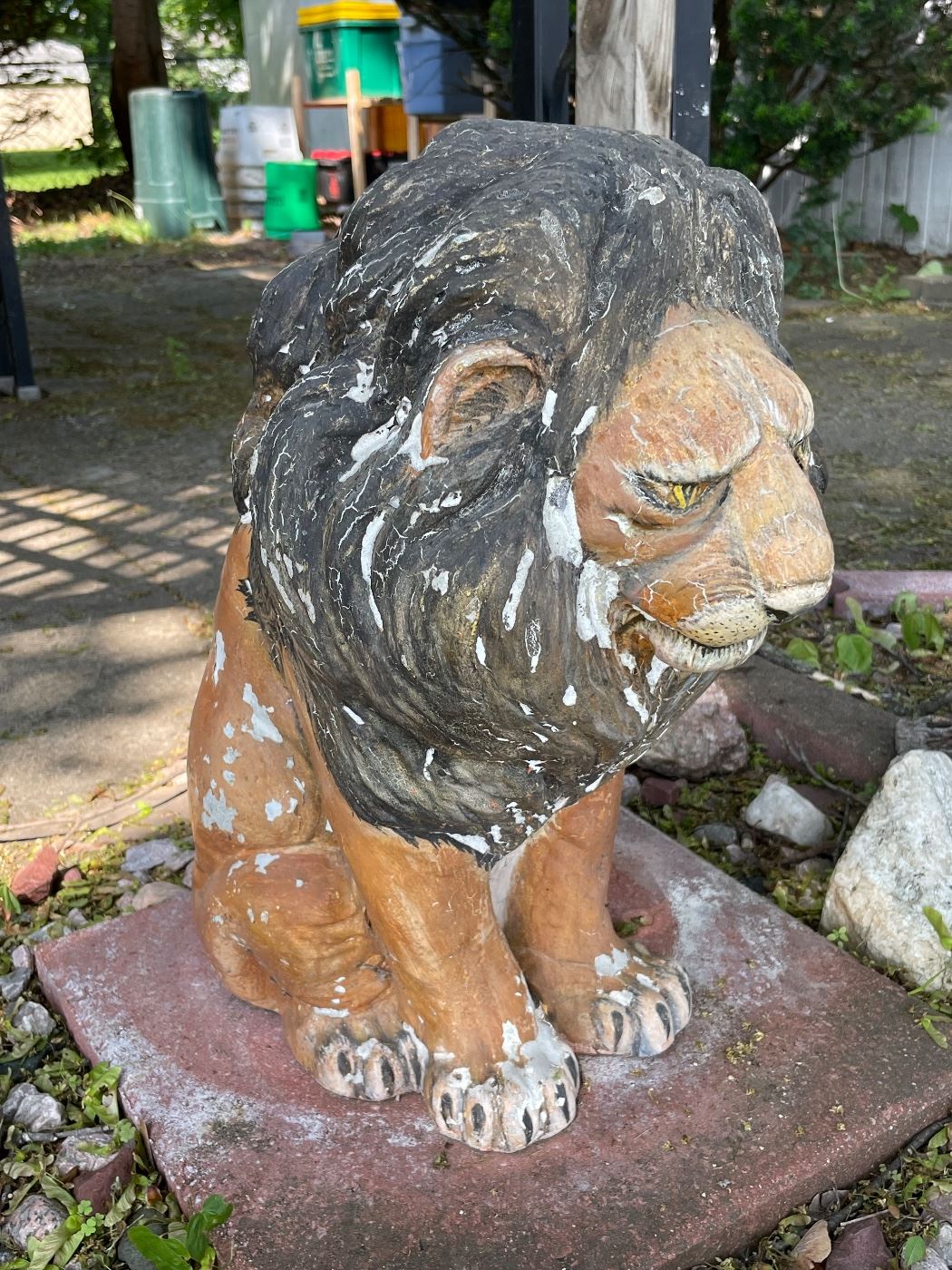 Cement lion for your front yard to scare away unwanted people/animals