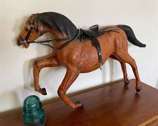 Leather wrapped rearing horse