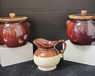 06 McCoy Pitcher And Pair Of Hull Pottery Bean Pots WLids